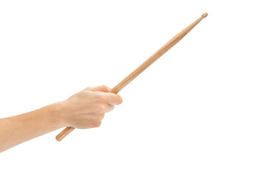 Woman's hand holding drum stick isolated on white background. - 303206073
