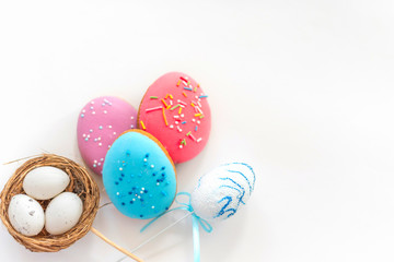 Fototapeta na wymiar Easter gingerbreads on white background. Easter sweets fo celebrate. 