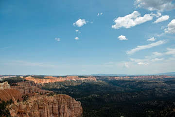 Valley at Bryce Canyon with mountains full of trees