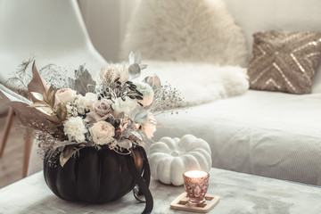 Beautiful composition of flowers in the interior of the room.