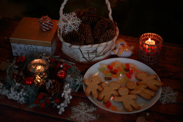 Christmas gifts, lights, candles and sweets