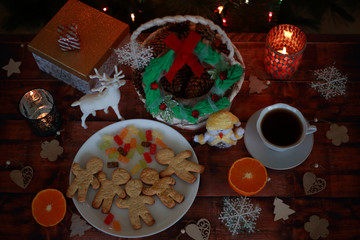 Christmas wreath with gifts and sweets with deer and orange