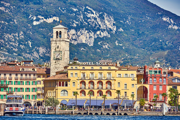 Riva del Garda,Lago di Garda ,Italy - 3 October 2018:View to the port of Riva del Garda and the beautiful Riva del Garda town, Garda lake in the summer time , Italy