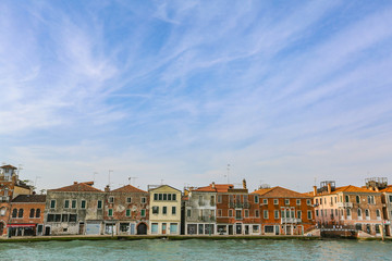 Fototapeta na wymiar The colorful landscape of a historic city on the water. Venice, Italy
