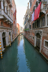 Obraz na płótnie Canvas The colorful landscape of a historic city on the water. Venice, Italy
