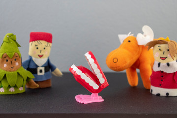 Funny and comic toy teeth and finger puppets. promote dental health to children