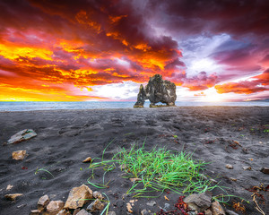 Dramatic sunset view of fHvitserkur unique basalt rock in Iceland