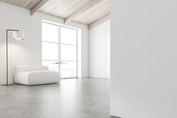 Attic living room corner with armchair