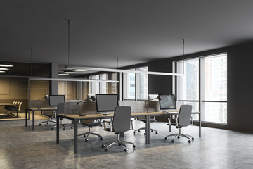Gray open space office corner with meeting rooms