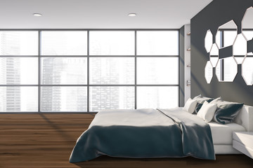 Side view of gray panoramic bedroom with mirrors