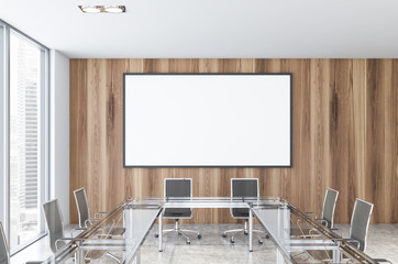Wooden wall conference room with poster