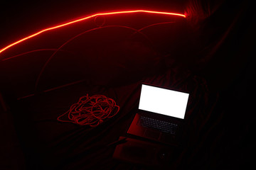 The laptop is on the bed. After shibari photoshoot.