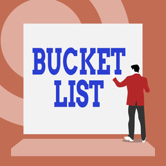 Handwriting text writing Bucket List. Conceptual photo a list of the things that a demonstrating would like to do or achieve Back view young man dressed suit standing platform facing blank rectangle