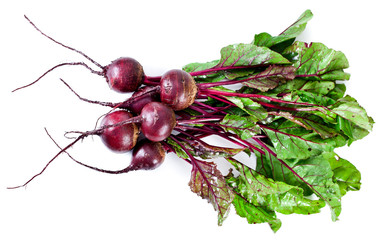Fresh red beet or beetroot isolated on a white background.