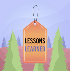 Word writing text Lessons Learned. Business photo showcasing the knowledge or understanding gained by experience Empty tag blank space colorful background label rectangle attached string