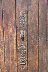 Metal fittings on wooden door