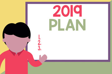 Conceptual hand writing showing 2019 Plan. Concept meaning setting up your goals and plans for the current year or in 2019 Man standing front whiteboard pointing to project photo Art