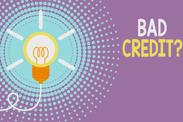 Writing note showing Bad Creditquestion. Business concept for inabilityof a demonstrating to repay a debt on time and in full Idea light bulb Successful turning idea invention Startup