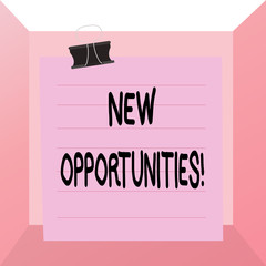 Conceptual hand writing showing New Opportunities. Concept meaning exchange views condition favorable for attainment goal Paper lines binder clip suare notebook color background