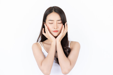 Fototapeta premium Young asian woman has smiling face and bright skin tone.Asian woman standing with isolated white background.