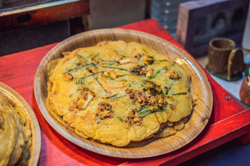 Typical Korean street food on a walking street of Seoul. Spicy fast food simply found at local Korean martket, Soul Korea