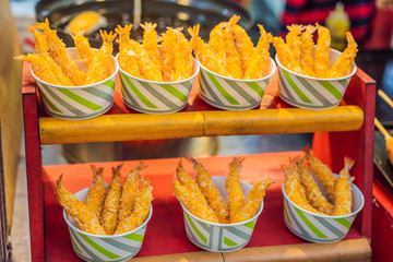 Typical Korean street food on a walking street of Seoul. Spicy fast food simply found at local Korean martket, Soul Korea