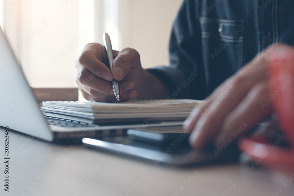 Wall mural Businessman working fromhome