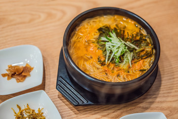 korean cuisine, spicy ramen noodles with spinach and egg