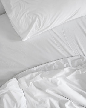 Messy White Bed Sheets