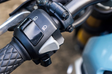 Obraz premium Racing Motorcycle throttle and Low and high beam close up.