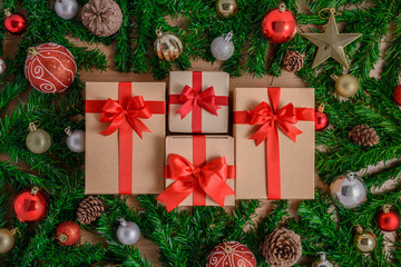 Christmas fir tree with decoration on wooden board