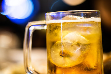 Background Cool beers with beer bubbles on top a glass at the party