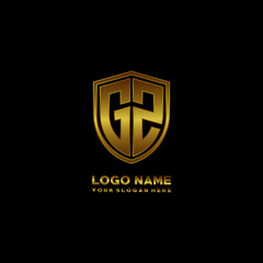 Initial letters GZ shield shape gold monogram logo. Shield Secure Safe logo design inspiration