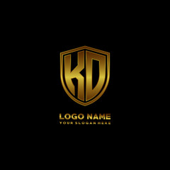 Initial letters KD shield shape gold monogram logo. Shield Secure Safe logo design inspiration