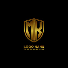 Initial letters MK shield shape gold monogram logo. Shield Secure Safe logo design inspiration
