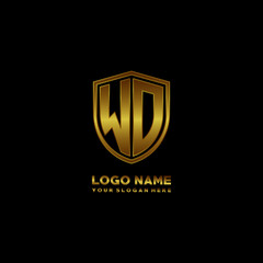 Initial letters WD shield shape gold monogram logo. Shield Secure Safe logo design inspiration