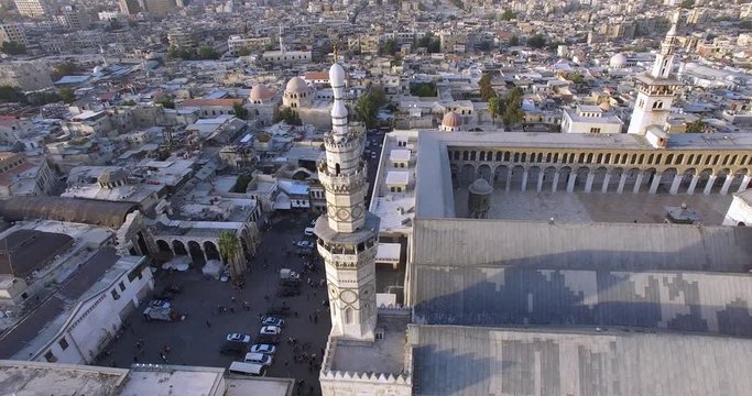 Turning around a minaret of Umayyad Mosque in Old Damascus, Syria. Umayyad Mosque, located in the old city of Damascus, is one of the largest and oldest mosques in the world
