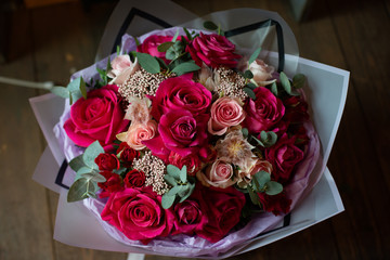 bouquet of flowers. Bouquet of natural fresh roses, tulips, anemones, peonies, ranunculi, matthiola, daffodil, cloves, eucalyptus. A bouquet of flowers is decorated in a composition of flowers 