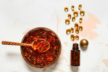 Composition with pills on light background