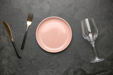 Beautiful table setting on dark background
