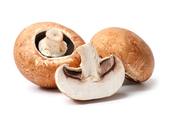 Fresh champignon mushrooms on white background