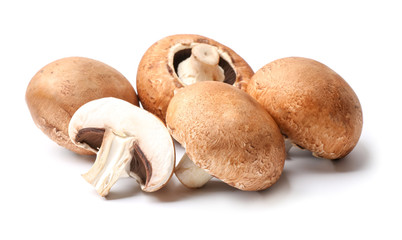 Fresh champignon mushrooms on white background