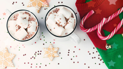 Homemade Christmas drinks with marshmallow on background