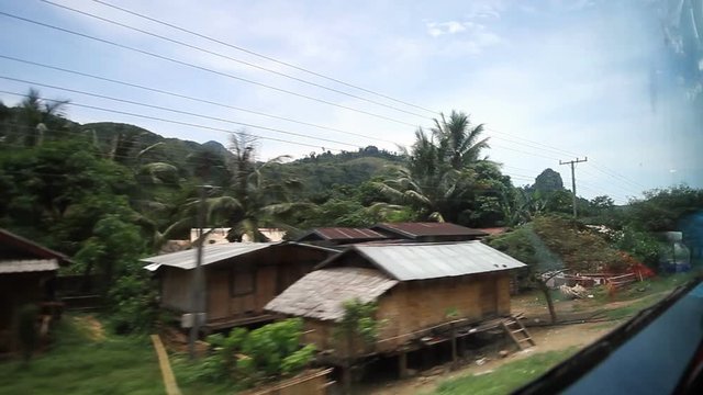 Driving through lao on a bus 