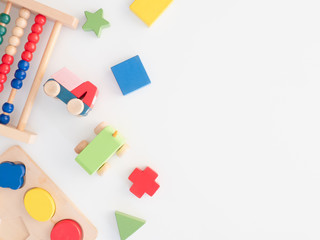 kids learning concept with stacking toys on white table background.