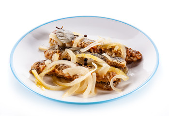 Marinated herrings on white background