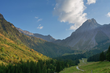 Fototapeta na wymiar Fantastic trekking of the beautiful French Alps with majestic peaks of rocky mountains.