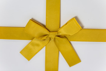 Gift with gold ribbon, macro, closeup, christmas