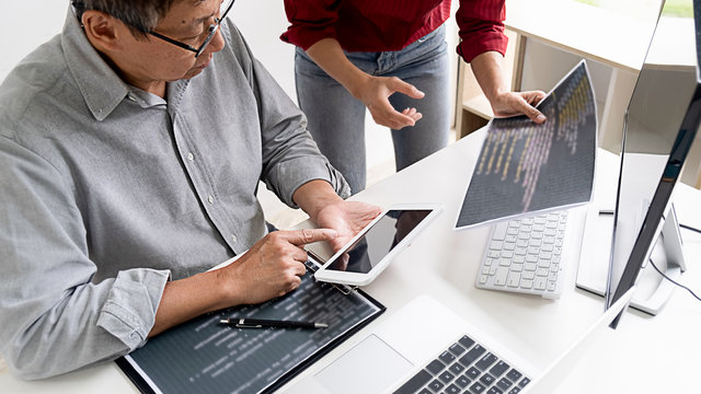 Programmer working in a software development and coding technologies. Website design. Technology concept.