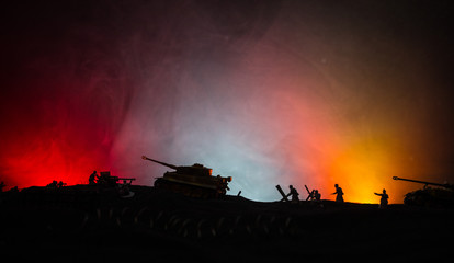 War Concept. Military silhouettes fighting scene on war fog sky background, World War German Tanks...